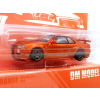 Nissan Skyline GT-R R34 orange - skala 1:64 - DM Model